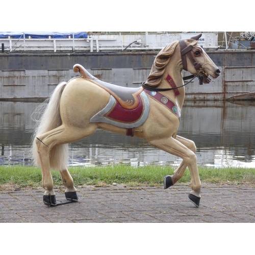374 - A Victorian fairground carousel galloper horse, the jointed wooden body with carved detail, named Su...