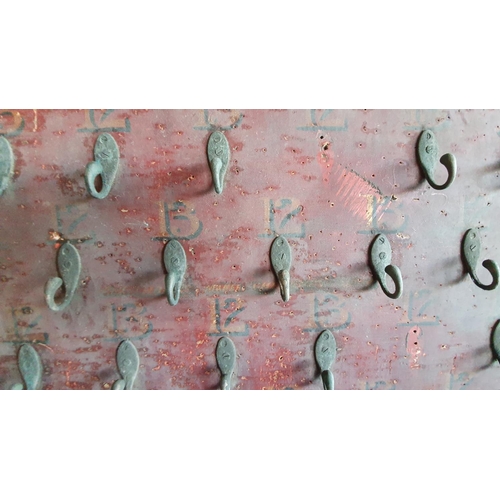 379 - A pianted wood Hoopla board with brass hooks, numbered 12 and 13, diameter 90 cm.