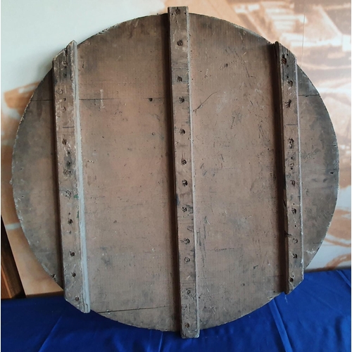 379 - A pianted wood Hoopla board with brass hooks, numbered 12 and 13, diameter 90 cm.