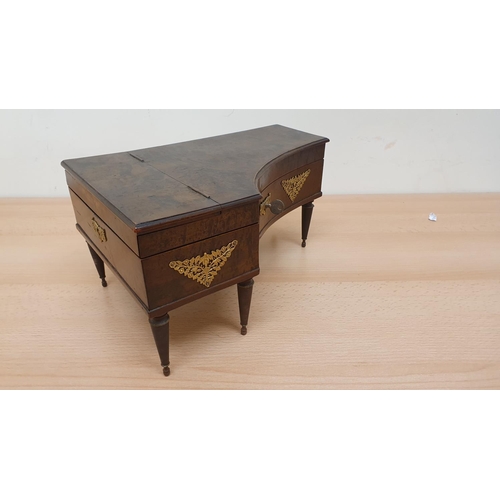 418 - A French 19th century musical box/sewing box/jewellery box in the form of a grand piano, opening to ... 