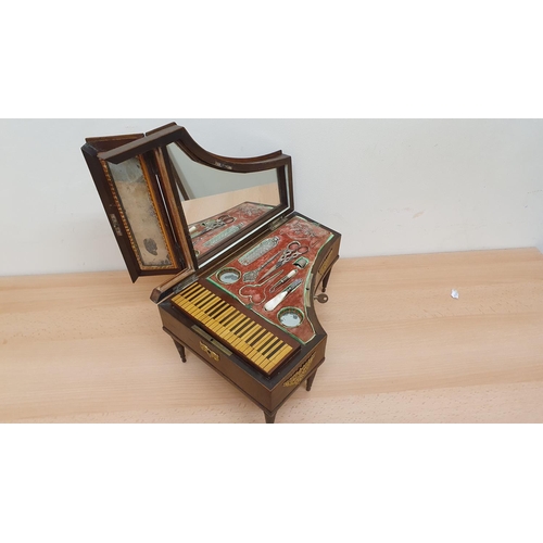 418 - A French 19th century musical box/sewing box/jewellery box in the form of a grand piano, opening to ... 