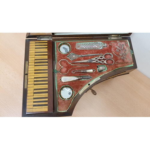 418 - A French 19th century musical box/sewing box/jewellery box in the form of a grand piano, opening to ... 