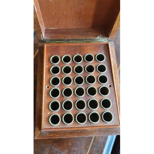 420 - An Edwardian burr walnut cigarette dispenser, opening to reveal 30 holders, 13 x 11 x 14 cm, not wor... 