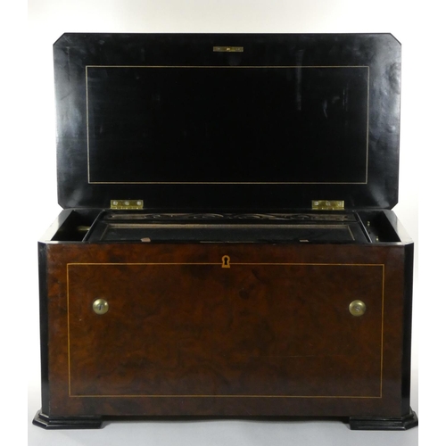 434 - A 19th century Swiss Music box in a burr walnut and ebonised case with 2 cones and central musical s... 