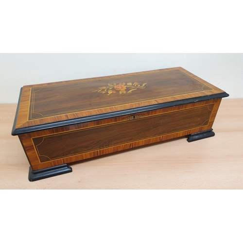 443 - A 19th century Swiss music box with rosewood and boxwood inlay, the single comb movement with Griffi... 