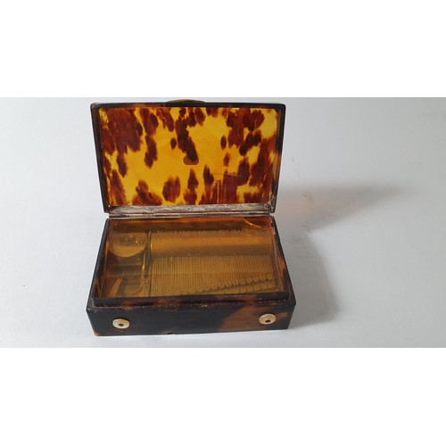 346 - A 19th century French silver and gold mounted tortoiseshell musical box, playing two tunes, bearing ... 