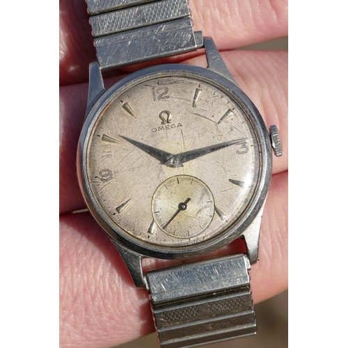 119 - Omega; a stainless steel gentleman's manual wind wristwatch, 15 jewel, cal 265, the silvered dial wi... 