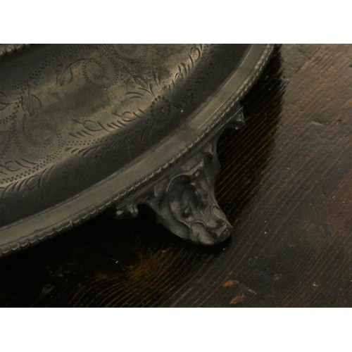 83 - A Victorian pewter cake stand with the original mirrored plate, beaded egg and dart borders framing ... 