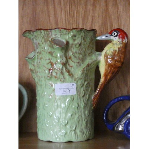 59 - A mid 20th century 'Ye Dainlee Ladyee' teapot, No. 824571 together with, Royal Falcon Ware water jug... 