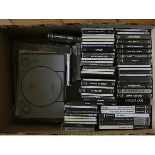 95 - A Sony Playstation console together with two Sony Playstation 2 complete with a selection of games, ... 