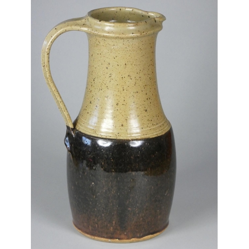 127 - An Unknown, a brown and beige mottled glazed stoneware flagon, height 26 cm, together with a small b... 