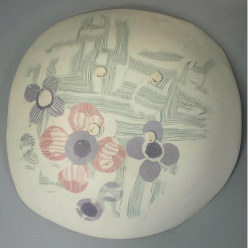 134 - Margery Clinton, a stoneware dish of irregular square form, painted with flowers and abstract patter... 
