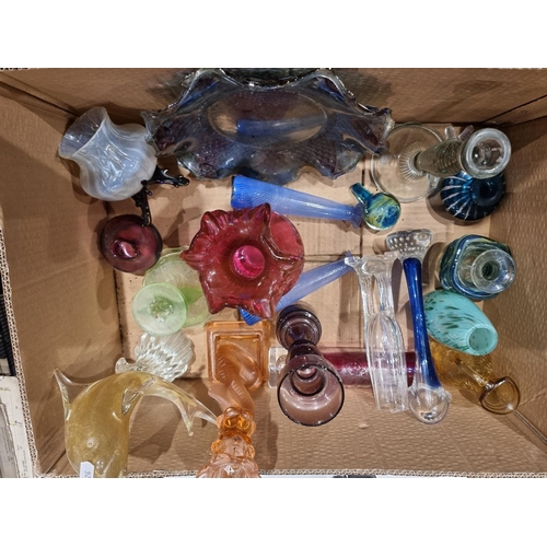 86 - A Loetz style glass vase, two press molded fish candlesticks and other glassware.