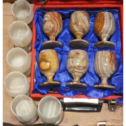 90 - To be sold on behalf of Monkey World, 2 sets of 6 onyx goblets, two sets of 4 onyx goblets and 1 set... 