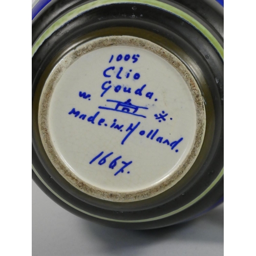 112 - A Gouda baluster vase, decorated in the Clio pattern, signed to the base, 24 cm.