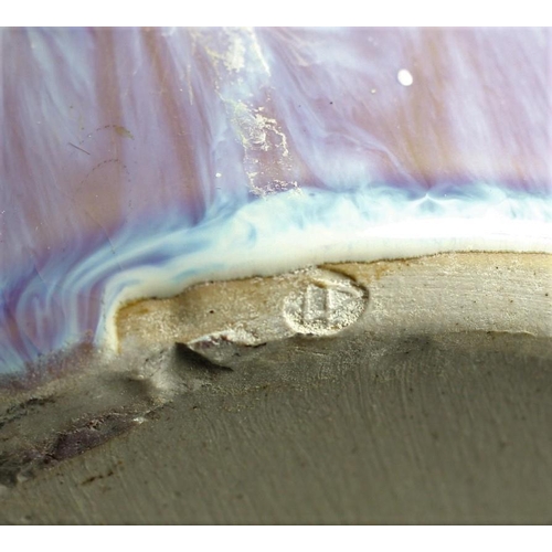 132 - A mid-20th century oval platter with abstract design, impressed mark signed and dated 1999, diameter... 