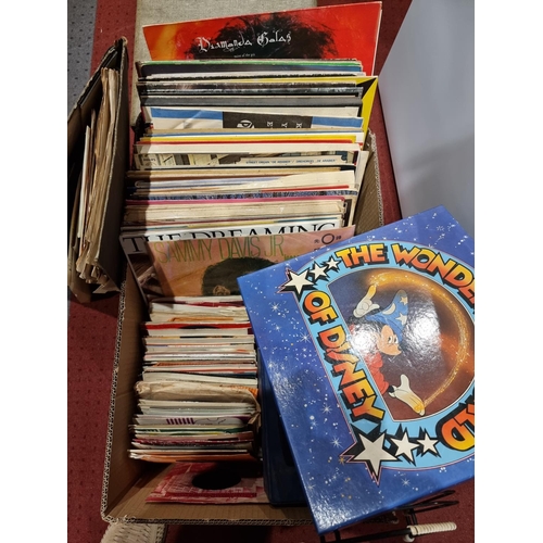 76 - A collection of vinyl records including 45 and 33 rpm, record carry case, and a folder of sheet musi... 