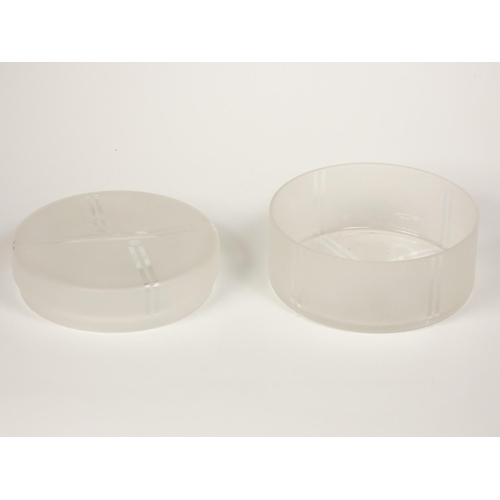 130 - An Unknown, a frosted glass trinket holder with lid, line and dot detail, diameter 10cm,  a Whitefri... 