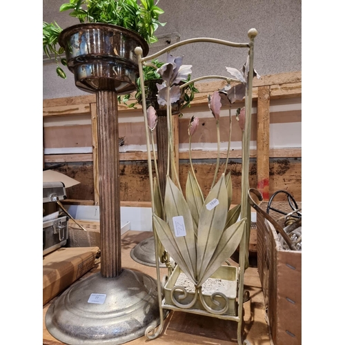 77 - A pair of plated plant stands together with a floral umbrella stand, candlestick holders and glass t... 
