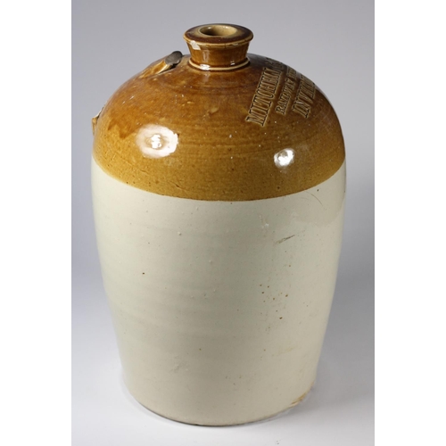 85 - A stoneware flagon marked 'Mitchell & Craig Railway Building, Inverness', height 36 cm, no handle