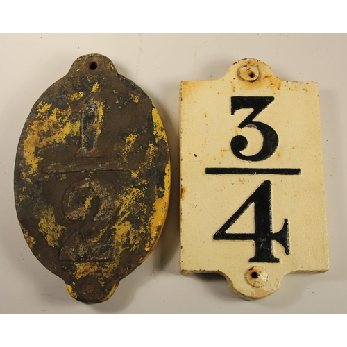 103 - Two cast-iron mile post markers from Scotland 1/2 and 3/4 (2)