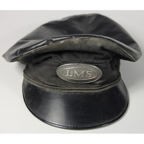 111 - Two drivers/firemens grease top caps, one with a metal LMS badge, the other with an LNER metal badge