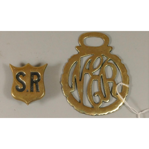 113 - An N.E.R horsebrass (without strap) and a small S.R brass shield from Souther Railway (2)