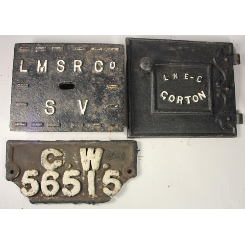 119 - An LNER Gorton cast-iron stove door front, a LMSR sluice valve cover and a G.W wagon plate (3)