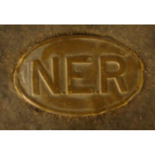 126 - An Edundson ticket-dater with oval 'N.E.R' plaque on top.