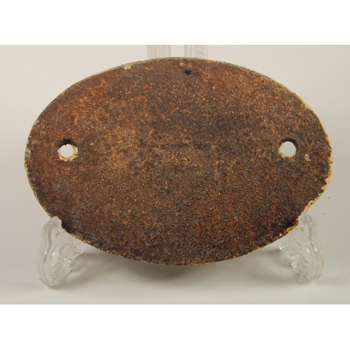 146 - An oval cast iron coach-builders plate 