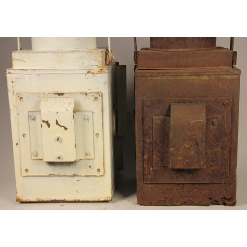 187 - A white B.R (m) tail lamp with burner, together with unmarked tail lamp (rusty) (2)