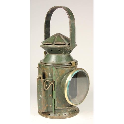 191 - A WD 1945 dark green 3 aspect hand lamp, body stamped with arrow and date, complete with burner and ... 