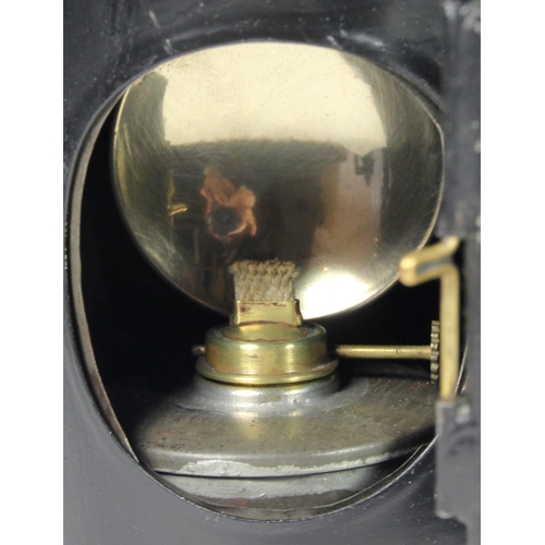 194 - A LMS 3 aspect handlamp with brass plaque 'LMS55346', complete with burner