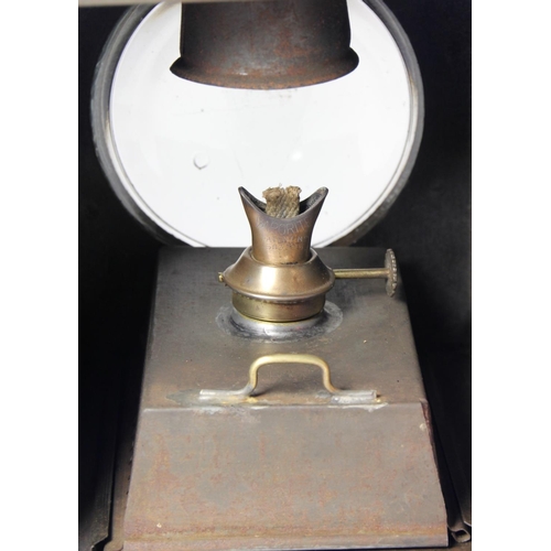 199 - A black B.R (W) side lamp, complete with burner