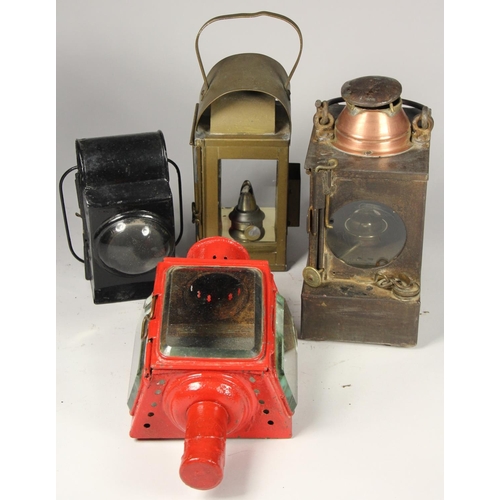 202 - A S.R copper-collared signal lamp complete with burner, together with a small unmarked hand lantern ... 