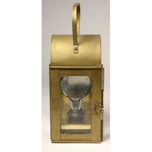 202 - A S.R copper-collared signal lamp complete with burner, together with a small unmarked hand lantern ... 