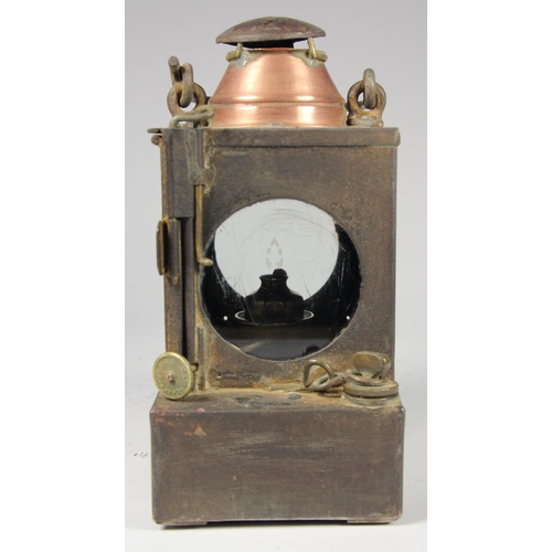 202 - A S.R copper-collared signal lamp complete with burner, together with a small unmarked hand lantern ... 