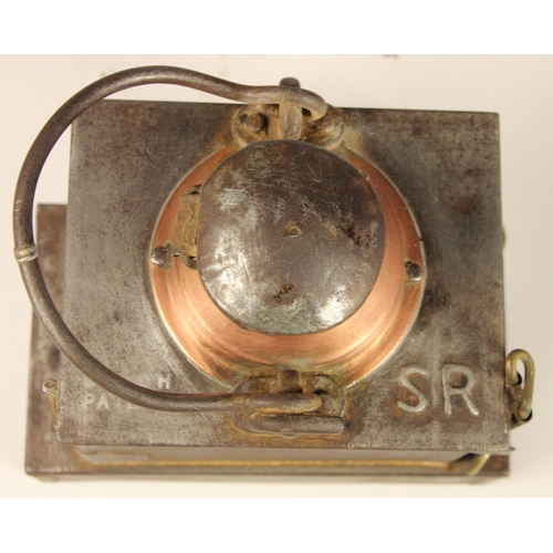 202 - A S.R copper-collared signal lamp complete with burner, together with a small unmarked hand lantern ... 