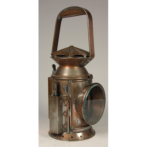 205 - A WD 1954 brass 3 aspect hand lamp, body stamped with arrow and date, complete with burner and glass... 