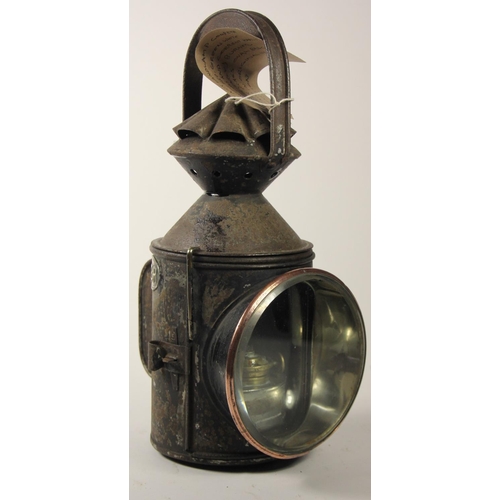 213 - An N.E.R 3 aspect hand lamp, complete with glass and original burner, stamped N.E.R