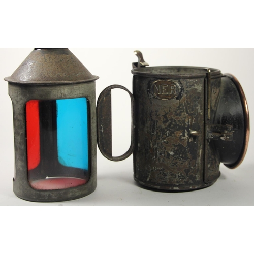 213 - An N.E.R 3 aspect hand lamp, complete with glass and original burner, stamped N.E.R