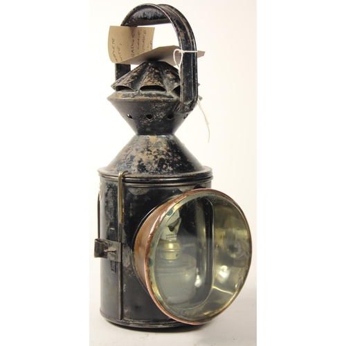 214 - An N.E.R 3 aspect hand lamp, complete with glasses and original burner, samped N.E.R