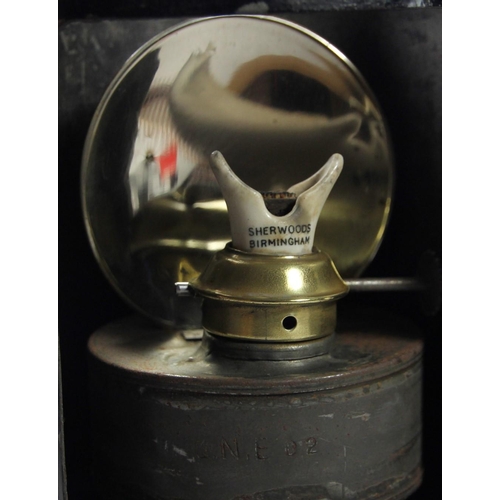 214 - An N.E.R 3 aspect hand lamp, complete with glasses and original burner, samped N.E.R