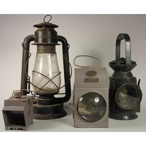 216 - A dark green 3 aspect no glasses WD 1944 handlamp, complete with burner, together with an American S... 