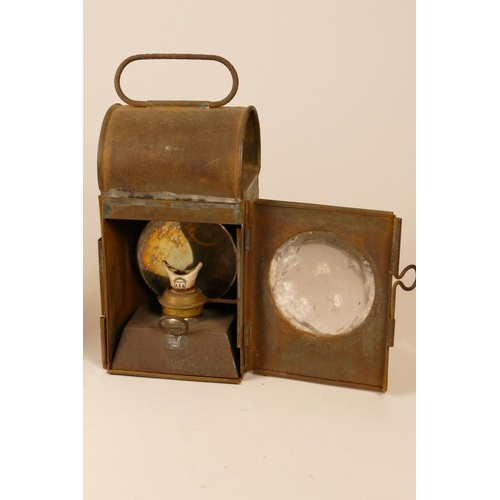 222 - An LNER hand lantern with burner, stamped LNER, together with an unmarked triangular lamp with burne... 