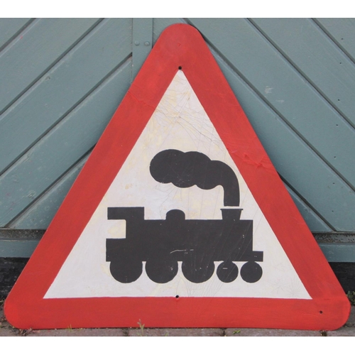 246 - A triangular train warning sign from an industrial site