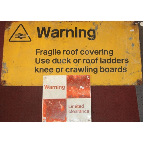 250 - A B.R. black and yellow tin warning sign, re. fragile roof covering together with a small red and wh... 