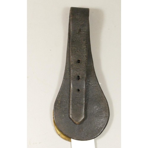 112 - An N.E.R horsebrass attached to leather strap, stamped N.E.R