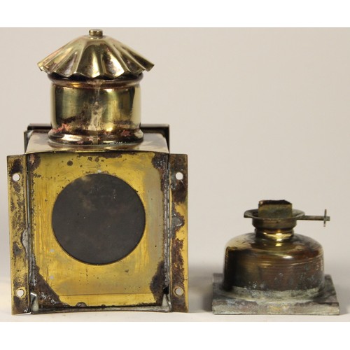 210 - A small brass ships compass binnacle lamp with burner, and a small BR carriage beveled mirror showin... 