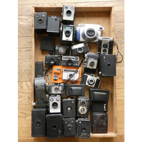 90 - A collection of vintage cameras and accessiores including Kodak Box Brownies along with others